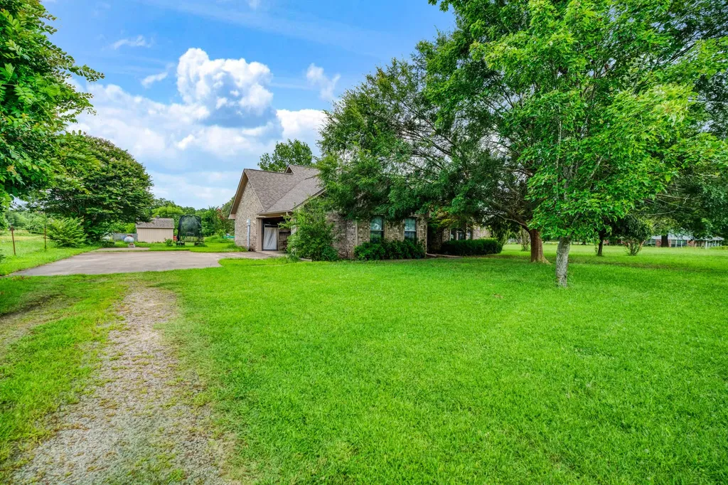 570 N Center Blossom TX 75416
