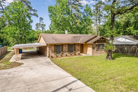 12118 Quail Hollow Lane Pinehurst TX 77362