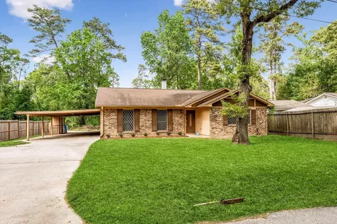 12118 Quail Hollow Lane Pinehurst TX 77362