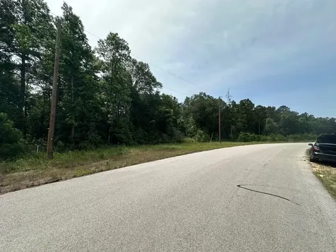 7-23-70 Sky Oak Lane Huntsville TX 77340