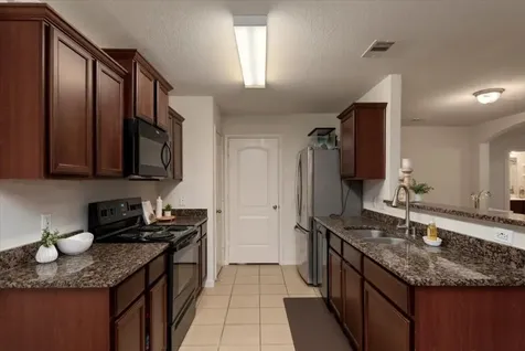 12035 Fairquarter Lane Pinehurst TX 77362