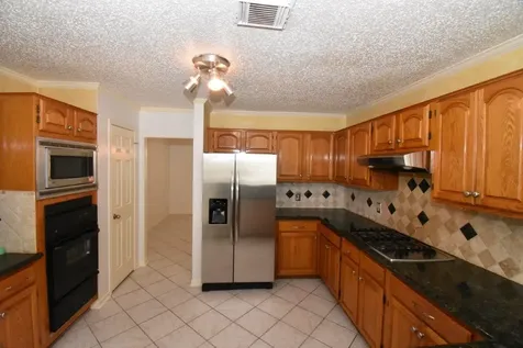 9007 Woodleigh Drive Houston TX 77083