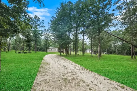 577 Winding River Road Oakhurst TX 77364
