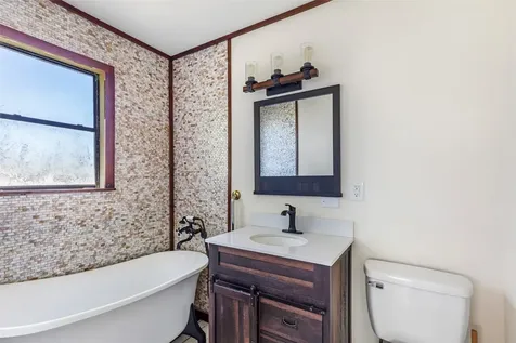 61 S Hilltop Street Point Blank TX 77364