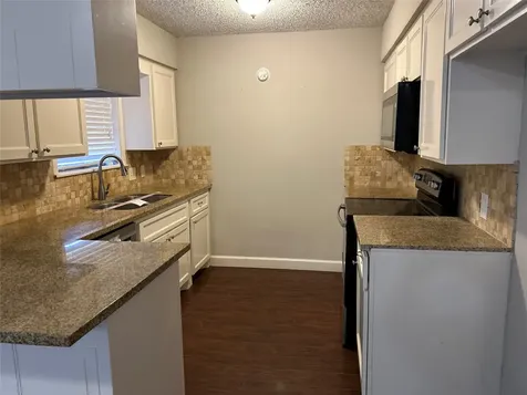 1805 King Arthur Court Pinehurst TX 77630