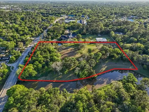 302 Whispering Pines Avenue Friendswood TX 77546