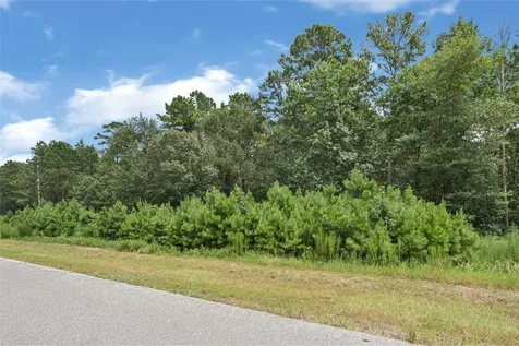 7-23-66 Sky Oak Lane Huntsville TX 77340