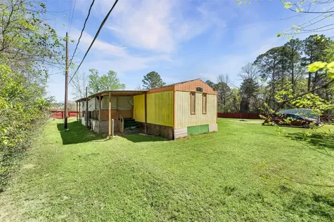 606 S S Pine Hill Street Pinehurst TX 77362