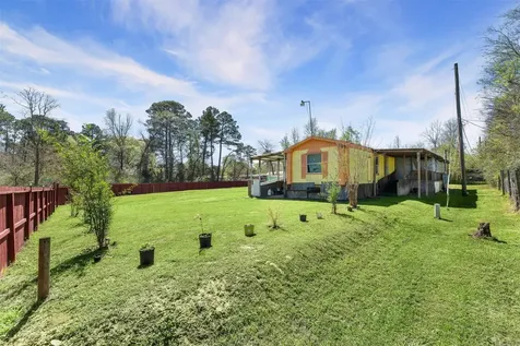 606 S S Pine Hill Street Pinehurst TX 77362