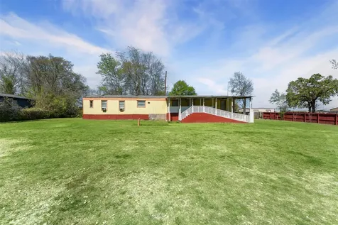 606 S S Pine Hill Street Pinehurst TX 77362