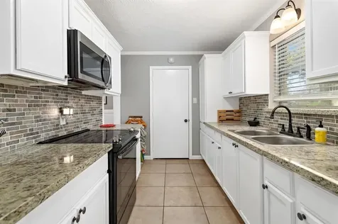 1845 King Arthur Court Pinehurst TX 77630