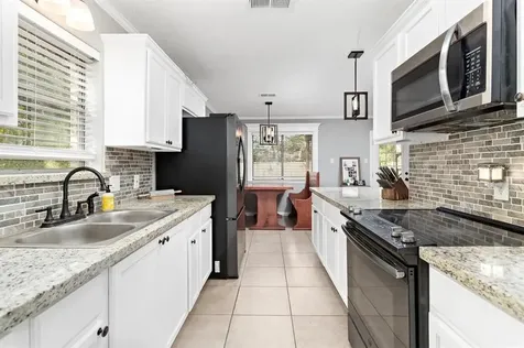 1845 King Arthur Court Pinehurst TX 77630