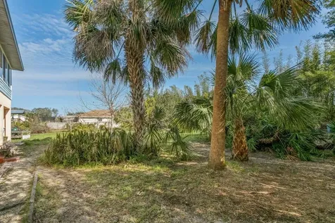 25 Armand Beach Drive + Vacant Lot Palm Coast FL 32137