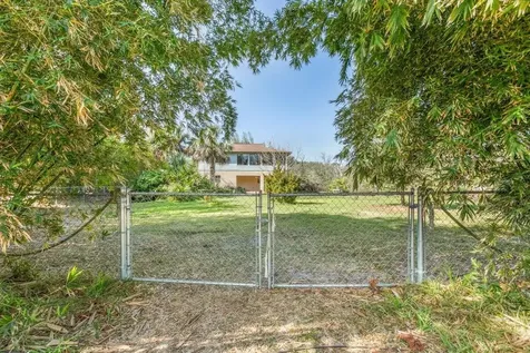 25 Armand Beach Drive + Vacant Lot Palm Coast FL 32137