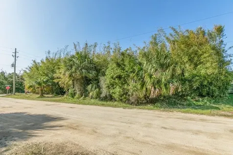 25 Armand Beach Drive + Vacant Lot Palm Coast FL 32137