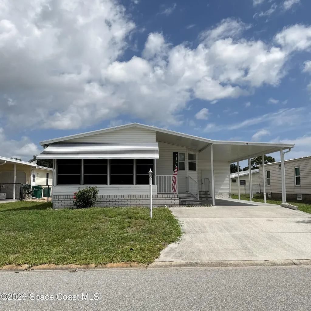 334 Macadamia Drive Barefoot Bay FL 32976