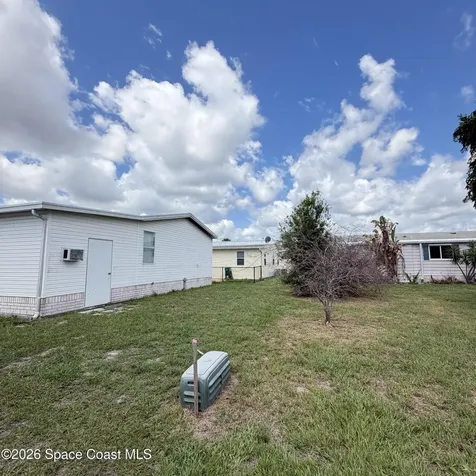 334 Macadamia Drive Barefoot Bay FL 32976