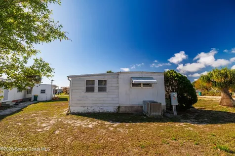 412 Osprey Drive Barefoot Bay FL 32976