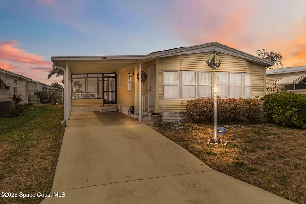 703 Amaryllis Drive Barefoot Bay FL 32976