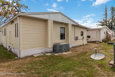 703 Amaryllis Drive Barefoot Bay FL 32976