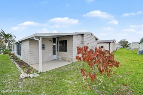 637 Wedelia Drive Barefoot Bay FL 32976