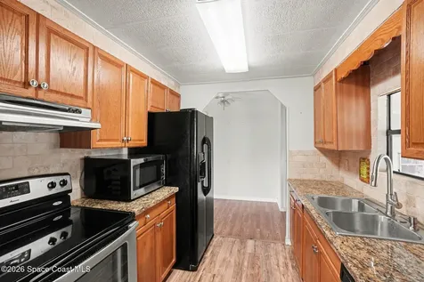 637 Wedelia Drive Barefoot Bay FL 32976