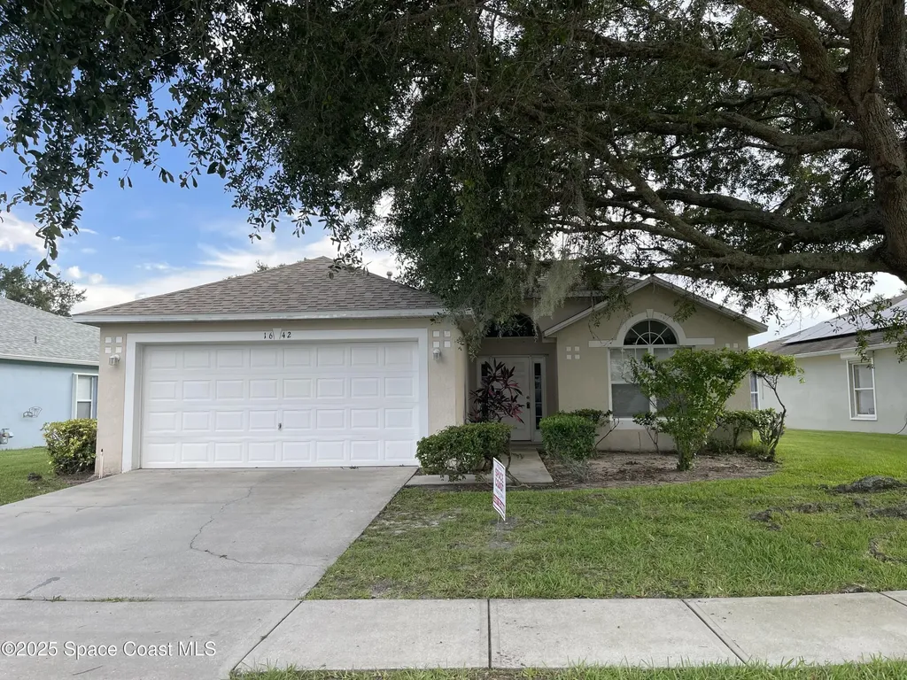 1642 Sawgrass Drive SW Palm Bay FL 32908