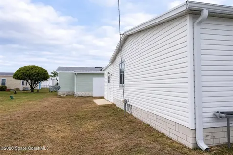 494 Papaya Circle Barefoot Bay FL 32976