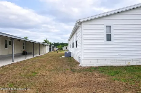 494 Papaya Circle Barefoot Bay FL 32976