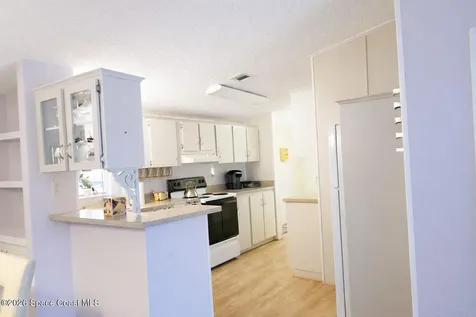 494 Papaya Circle Barefoot Bay FL 32976