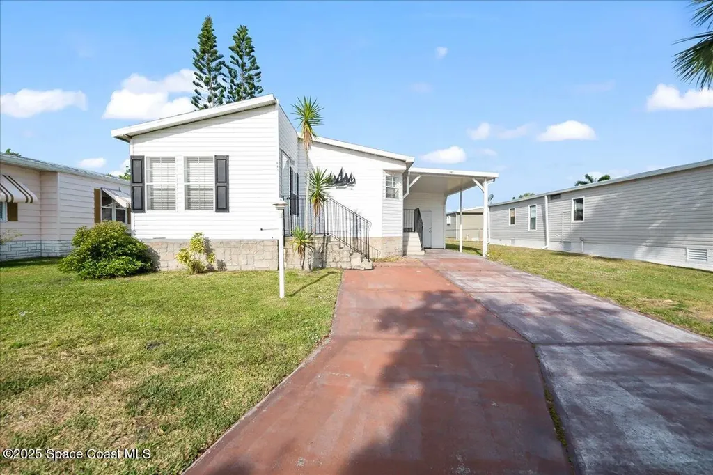 641 Hyacinth Circle Barefoot Bay FL 32976