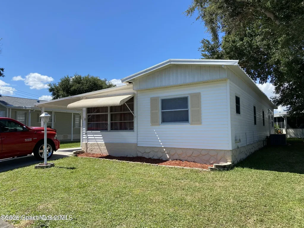 703 Lark Drive Barefoot Bay FL 32976