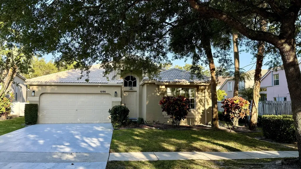 6166 Cotton Rose Lane Lake Worth FL 33467