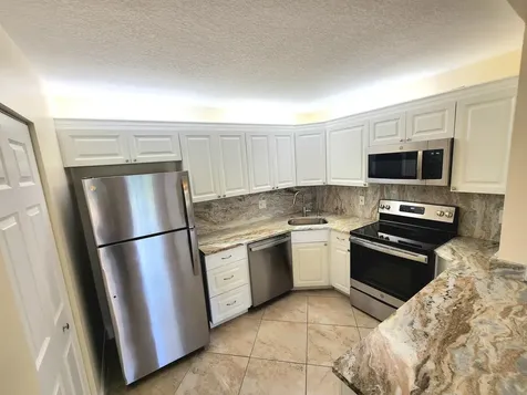 310 Knotty Pine Circle Greenacres FL 33463