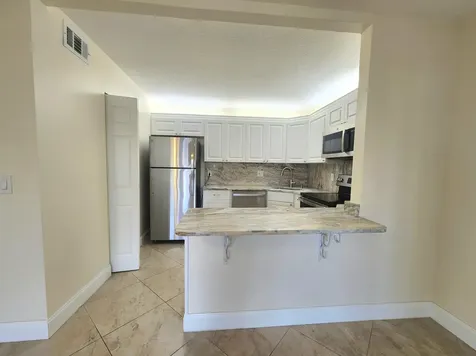 310 Knotty Pine Circle Greenacres FL 33463