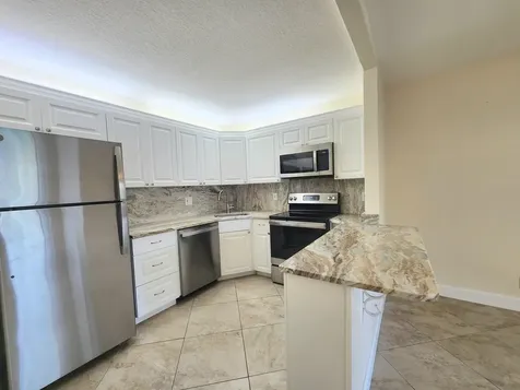 310 Knotty Pine Circle Greenacres FL 33463