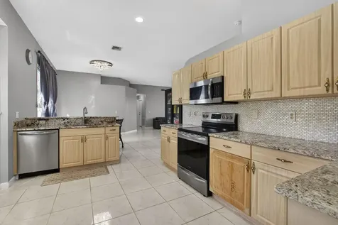 102 Brook Woode Court Royal Palm Beach FL 33411