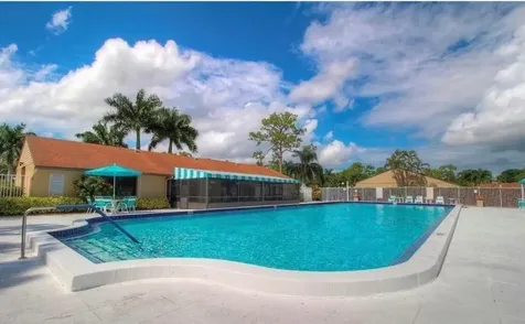 704 Sunny Pine Way Greenacres FL 33415