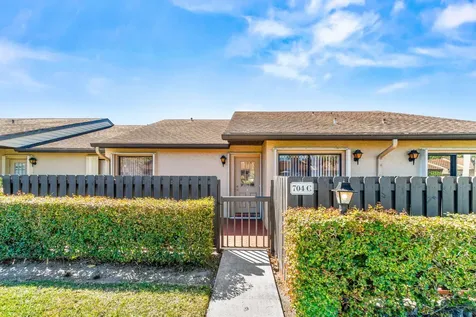 704 Sunny Pine Way Greenacres FL 33415
