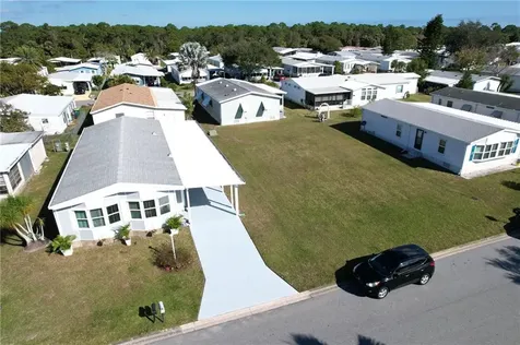 806 Lychee Drive Barefoot Bay FL 32976