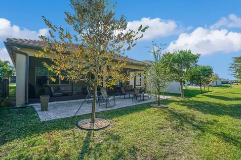 9571 Portugese Pine Grove Boynton Beach FL 33473