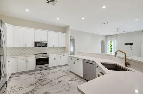 100 N Country Club Boulevard Atlantis FL 33462