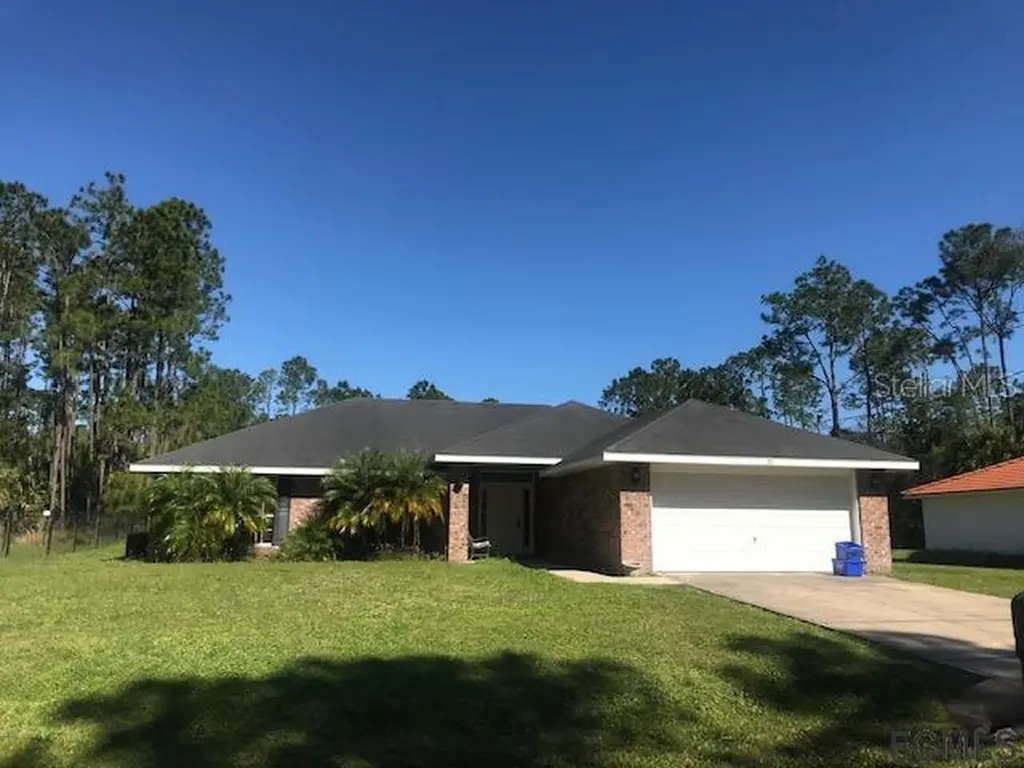77 Point Of Woods Drive Palm Coast FL 32164