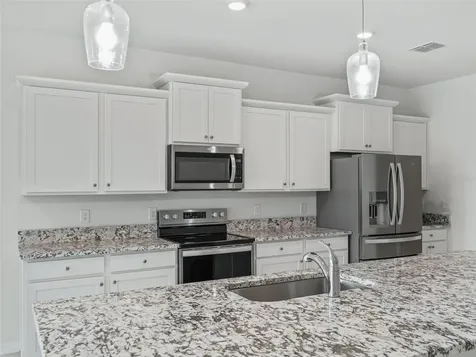 7889 Penrose Place Wildwood FL 34785
