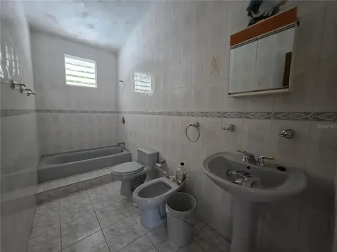 Bo. Cortes #417 San Juan Street Manati PR 00674