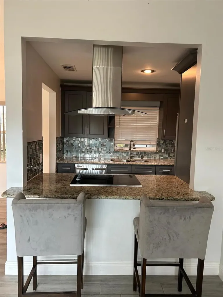 9739 Poplarwood Court Orlando FL 32825