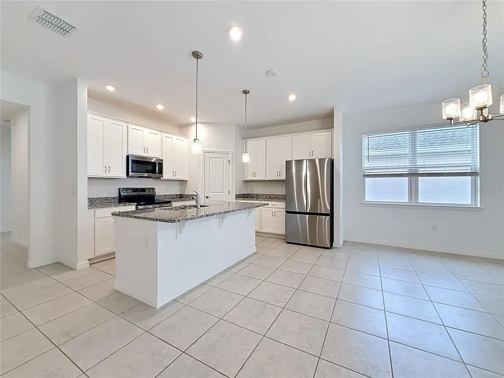418 Quayside Avenue Mascotte FL 34753
