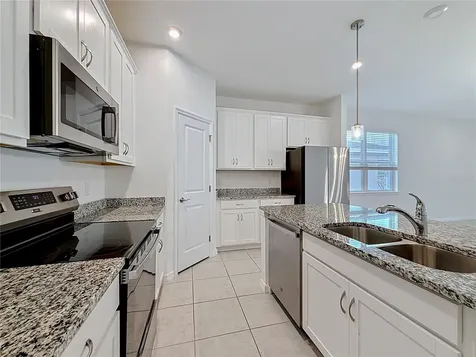 418 Quayside Avenue Mascotte FL 34753
