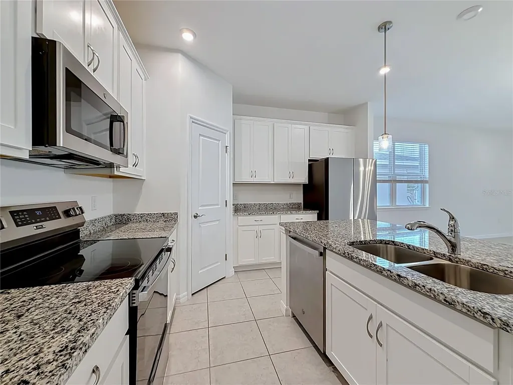 418 Quayside Avenue Mascotte FL 34753