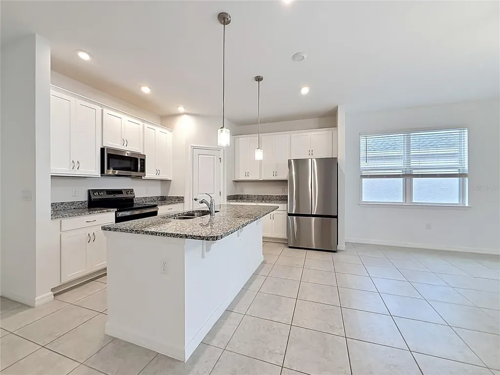 418 Quayside Avenue Mascotte FL 34753
